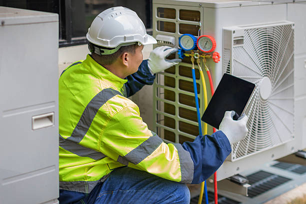 Professional Hvac technician working in Woods Hole, MA